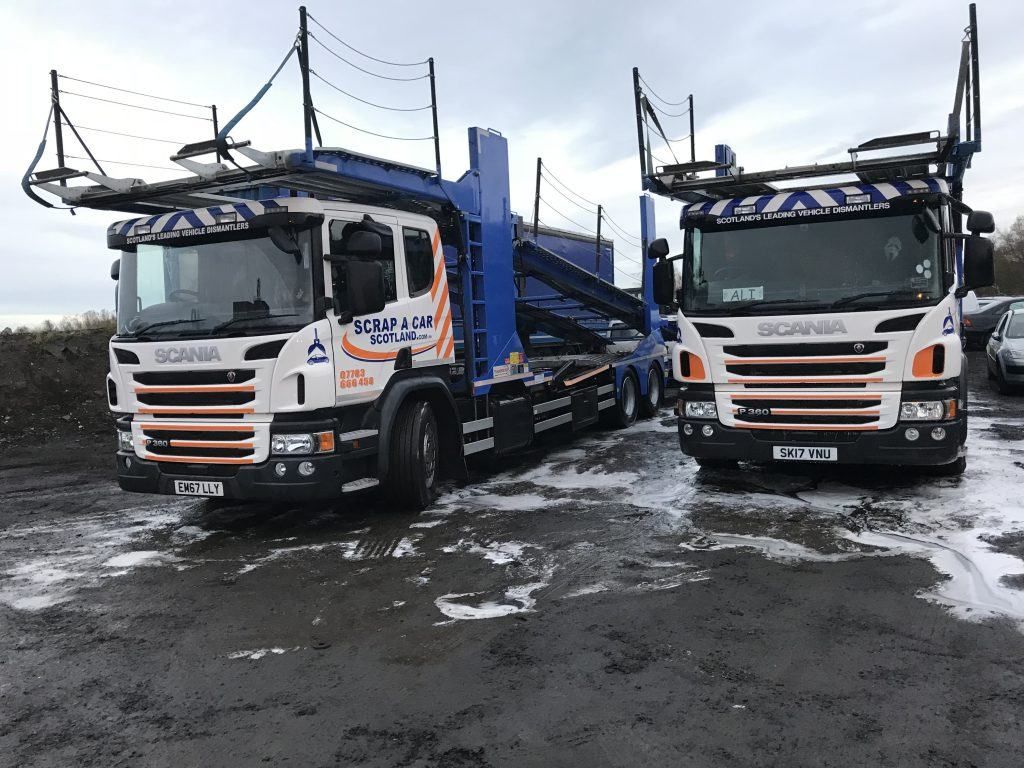 Two Scania transporters loaded with scrap cars collected across Scotland