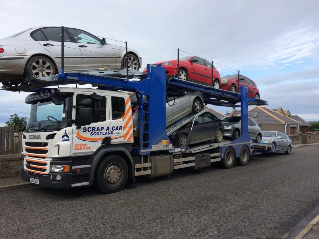 Scrap A Car Scotland transporter loaded with scrap cars on its way back to the Thornton depot in Fife